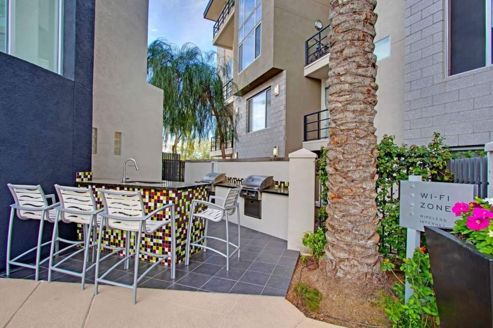 Grilling station with seating space at Ninety Degrees in Phoenix, Arizona