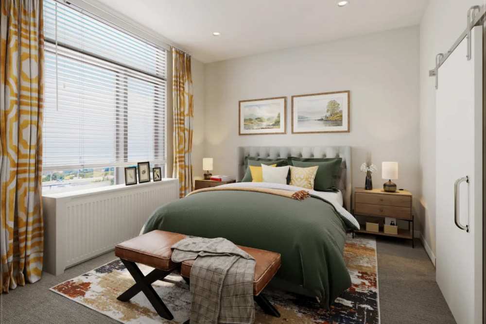Spacious bedroom with large comfortable bed and large windows at Clearwater at The Arboretum in Austin, Texas,