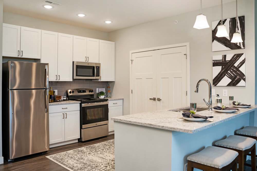 kitchen with bar seating at ((location_name}} in Avon, IN