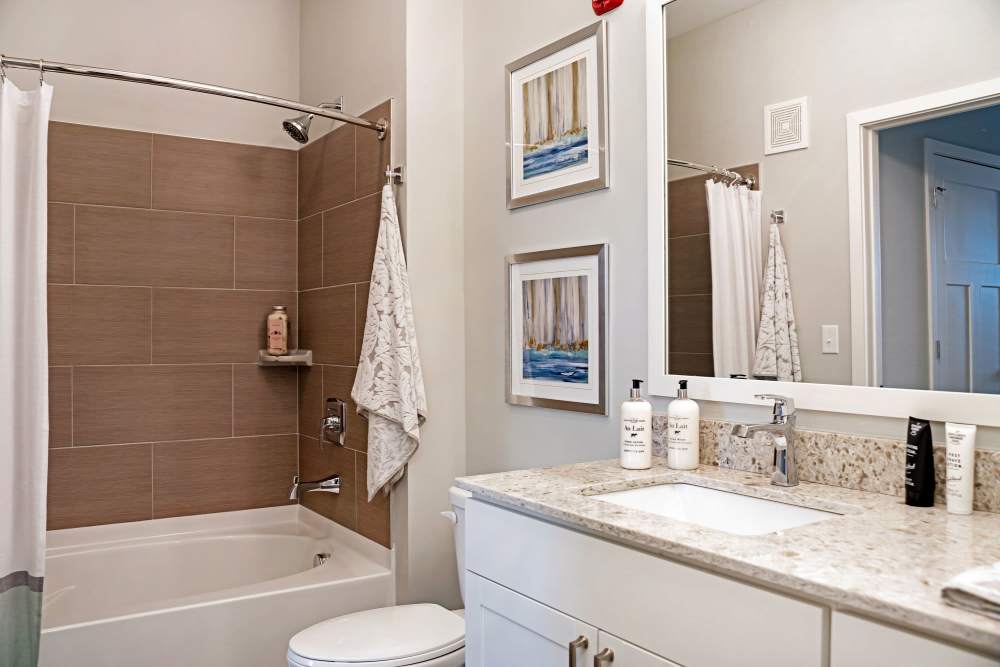 bathroom with shower at ((location_name}} in Avon, IN