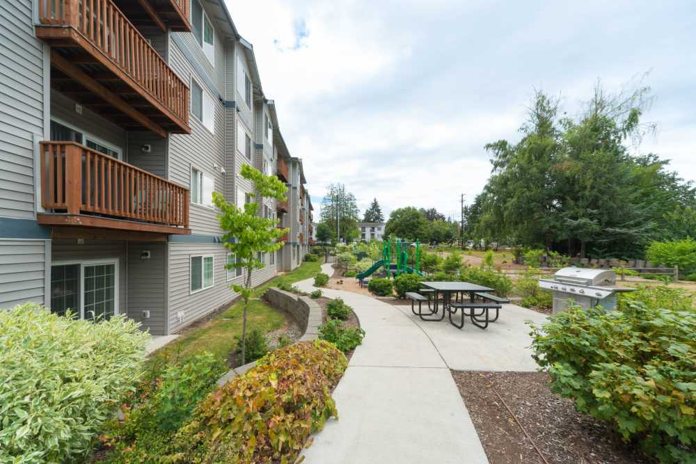 Image showing the plantation and walkway inside the property at Taylor Creek Apartments in Seattle,Washington