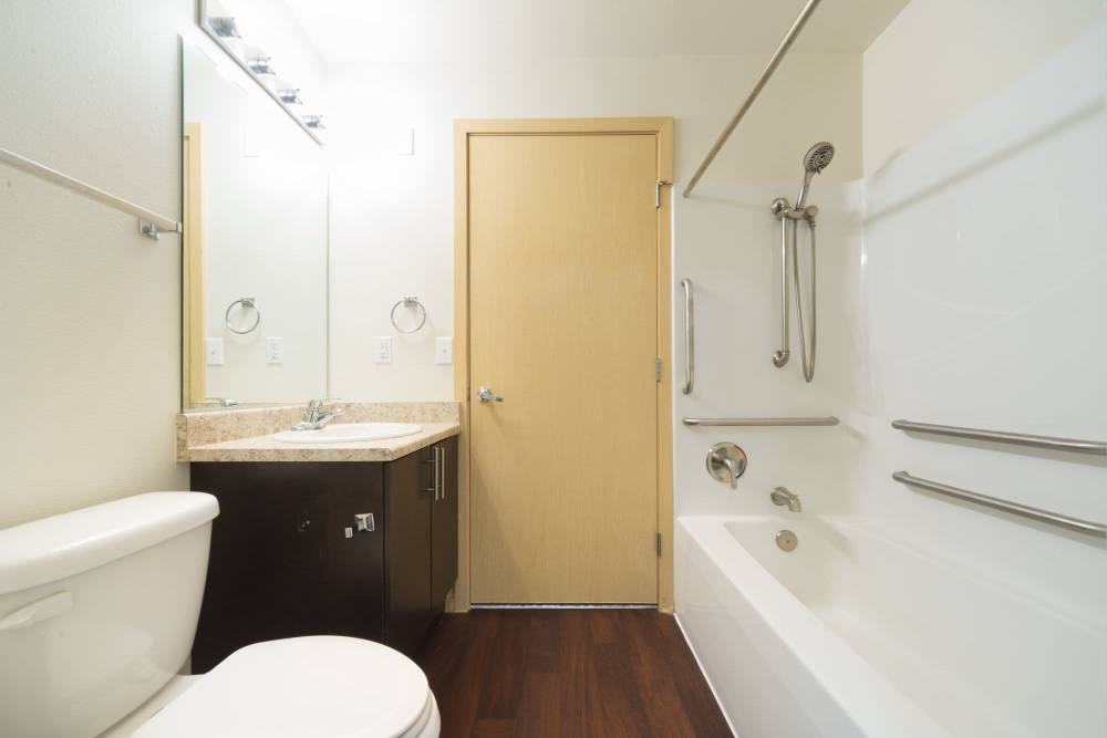 Bright bathroom with polished sanitary ware at Taylor Creek Apartments in Seattle,Washington