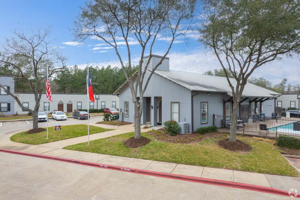 Exterior community view with car parking at Houston, Texas at Woodforest Chase