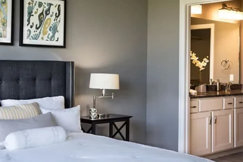Bedroom with private bathroom at The Residences at Old Hawthorne in Columbia, Missouri