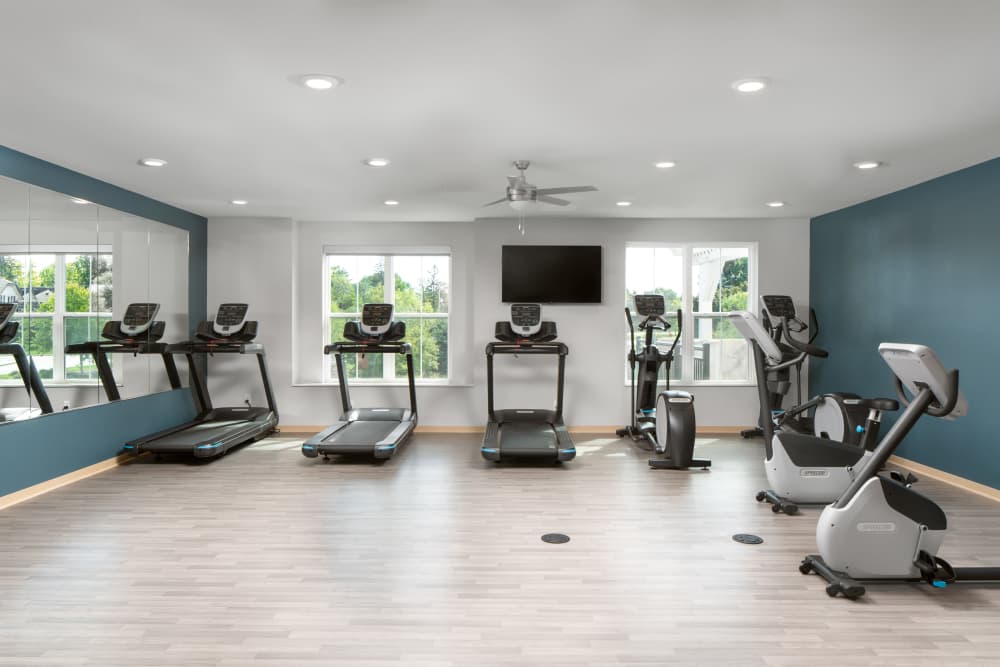 Cardio machines in fitness center at ((location_name}} in Brown Deer, WI