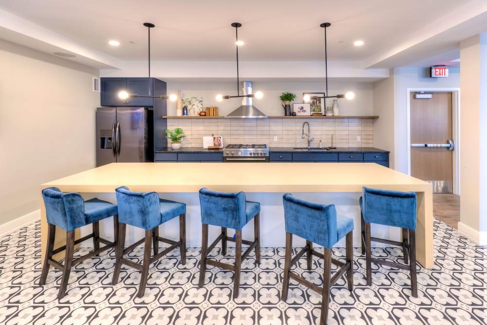 Community kitchen bar seating at Ellison in Des Plaines, Illinois