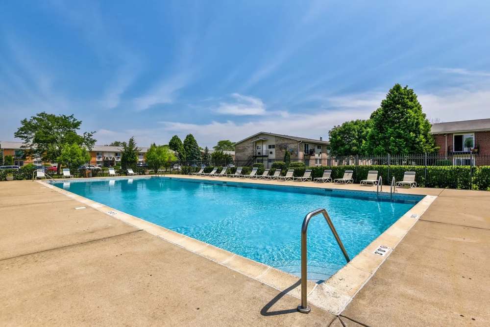 Swimming pool with laid back chairs at Park Ridge Commons in Des Plaines, Illinois