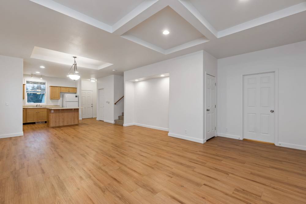 Living Room with Tray Ceilings in Discovery Village