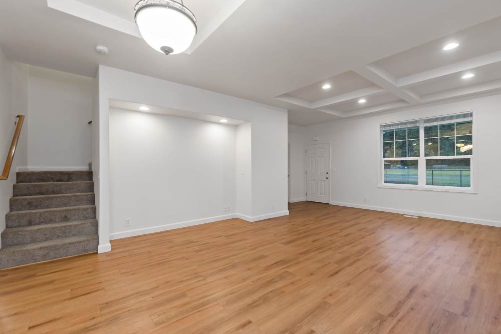 Living Room with LVP Flooring in Discovery Village