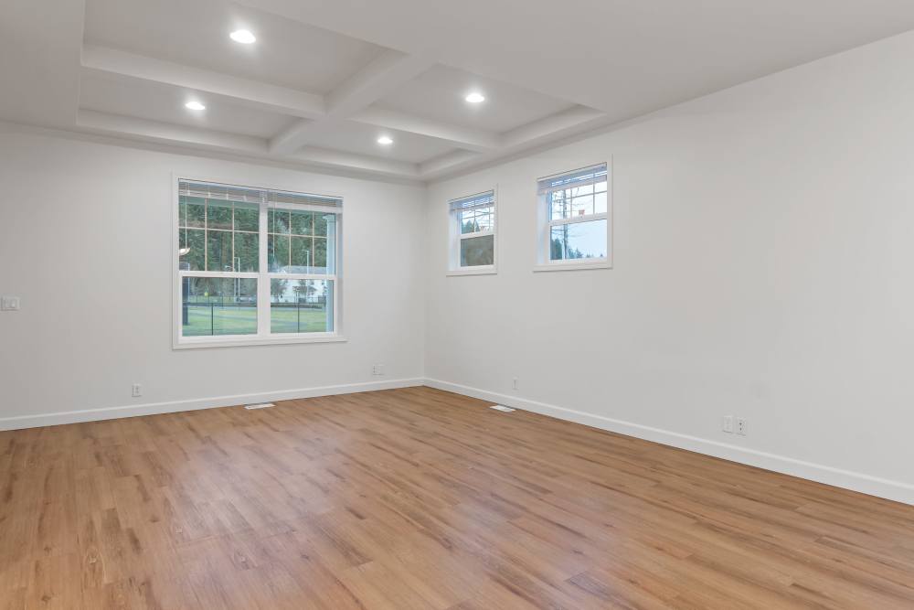 Living Room with Tray Ceilings in Discovery Village