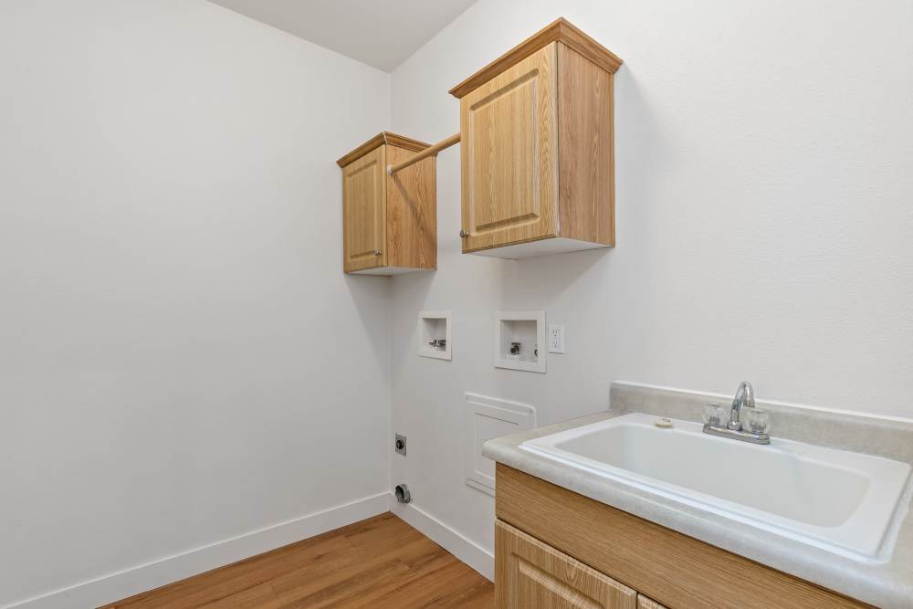 Laundry Room with Storage in Discovery Village