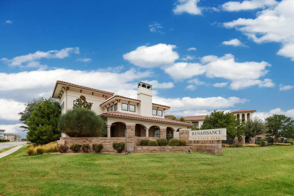 View of apartment exterior at Renaissance At North Park in Lubbock, Texas