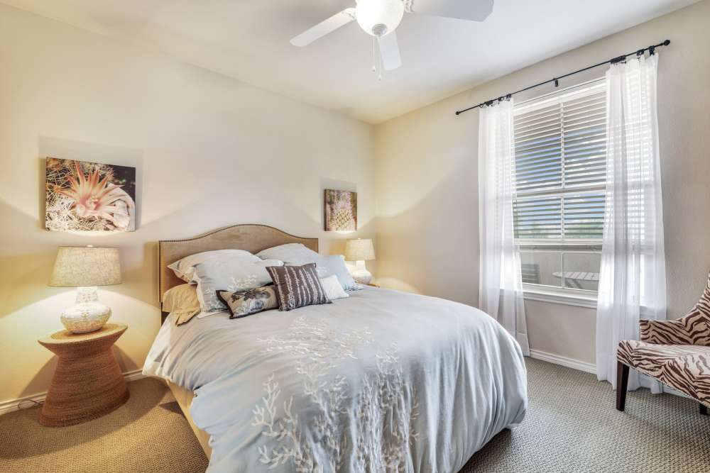 Cozy bedroom at Renaissance At North Park in Lubbock, Texas
