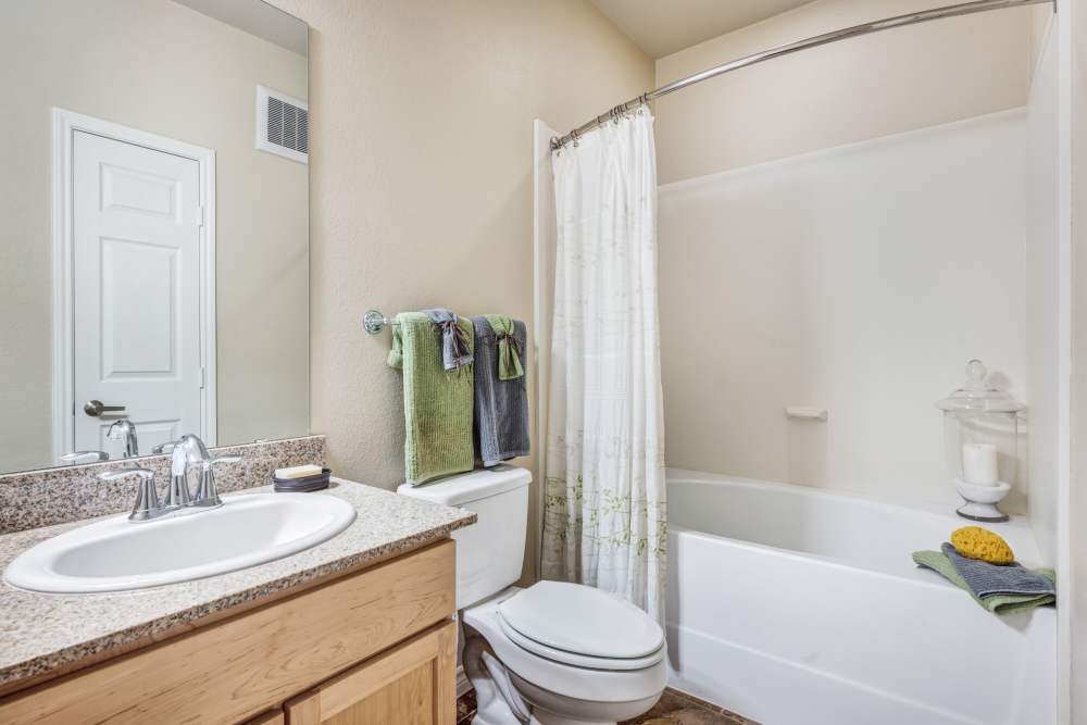 Apartment bathroom at Renaissance At North Park in Lubbock, Texas