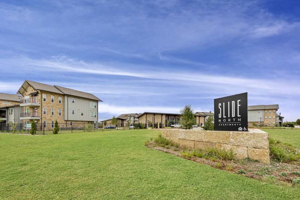 Exterior greenery at Slide North Apartments in Lubbock, Texas