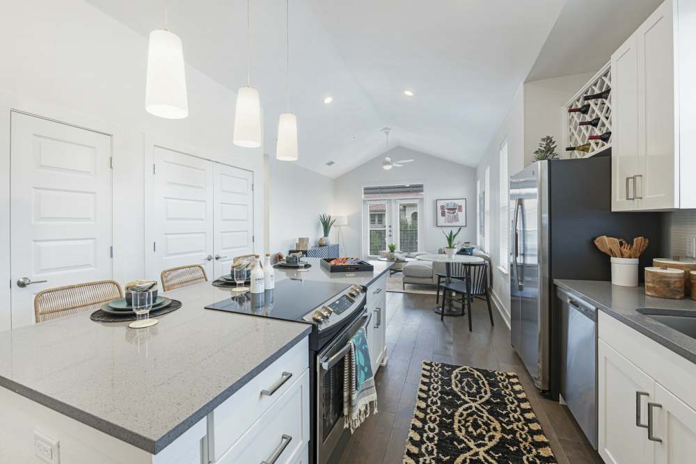Apartment kitchen with appliances at Slide North Apartments in Lubbock, Texas