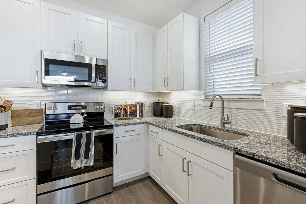 Stainless-steel appliances at Slide North Apartments in Lubbock, Texas