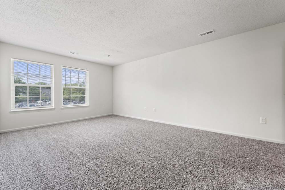 Bedroom with a window at Dulles Center Apartments in Herndon, Virginia