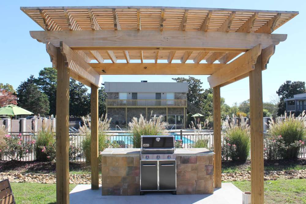 Grilling station by the pool at The Grove At Hickory Valley in Chattanooga, Tennessee