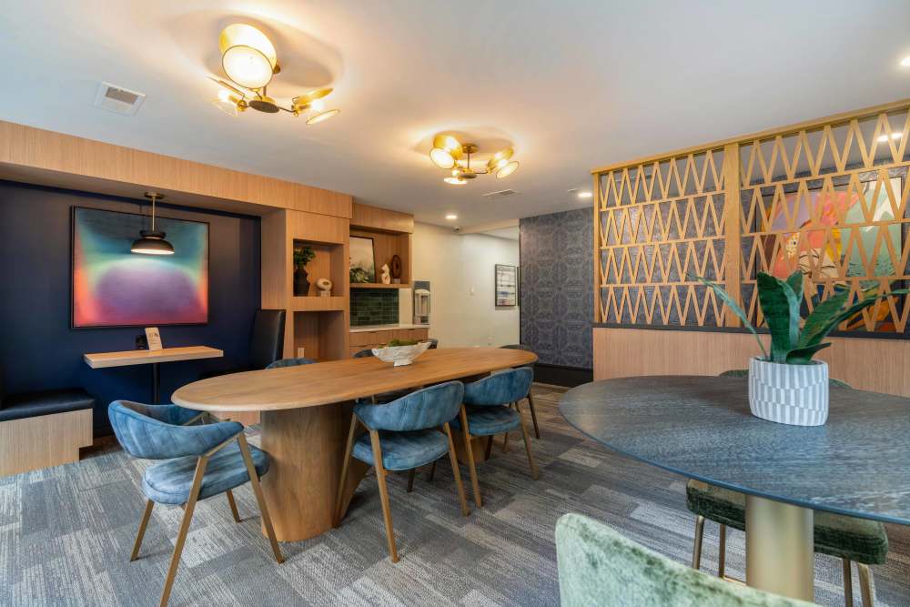 Clubhouse with tables and seating at Knoll at Fair Oaks in Fairfax, Virginia