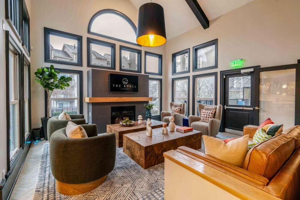Lounge with fireplace at Knoll at Fair Oaks in Fairfax, Virginia