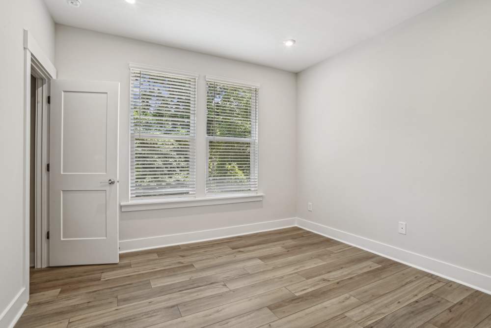 Spacious bedroom with a window for natural lighting at Reve Noda Junction in Charlotte,North Carolina