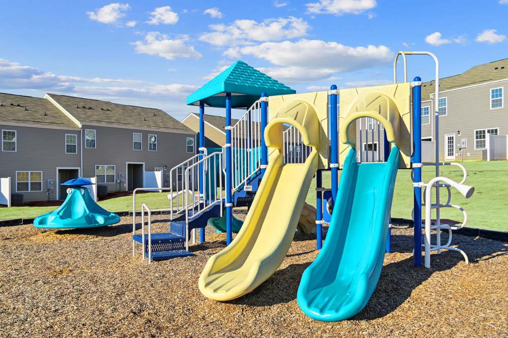 Playground with slide near Norman Ridge Townhomes in Terrell, North Carolina