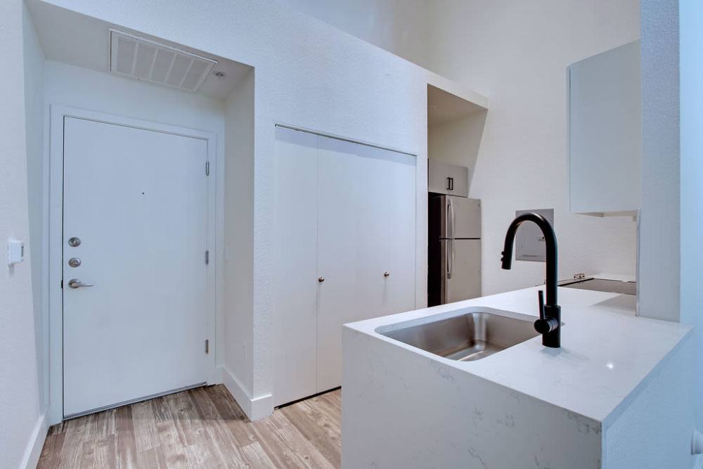 Kitchen with white cabinets at  Ninety Degrees in Phoenix, Arizona