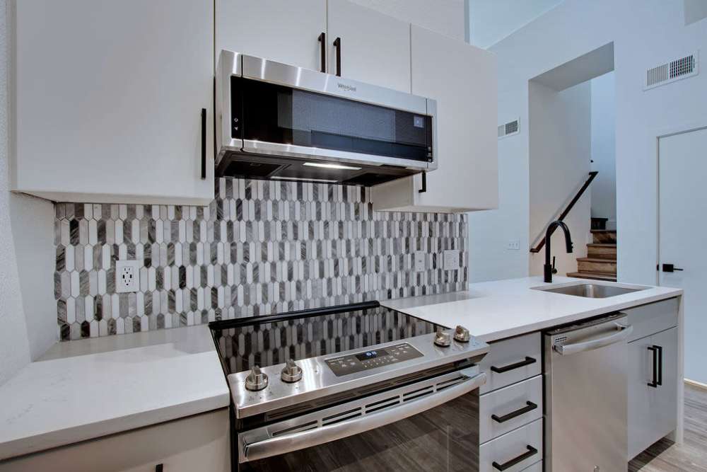 Kitchen with stainless-steel appliances at  Ninety Degrees in Phoenix, Arizona