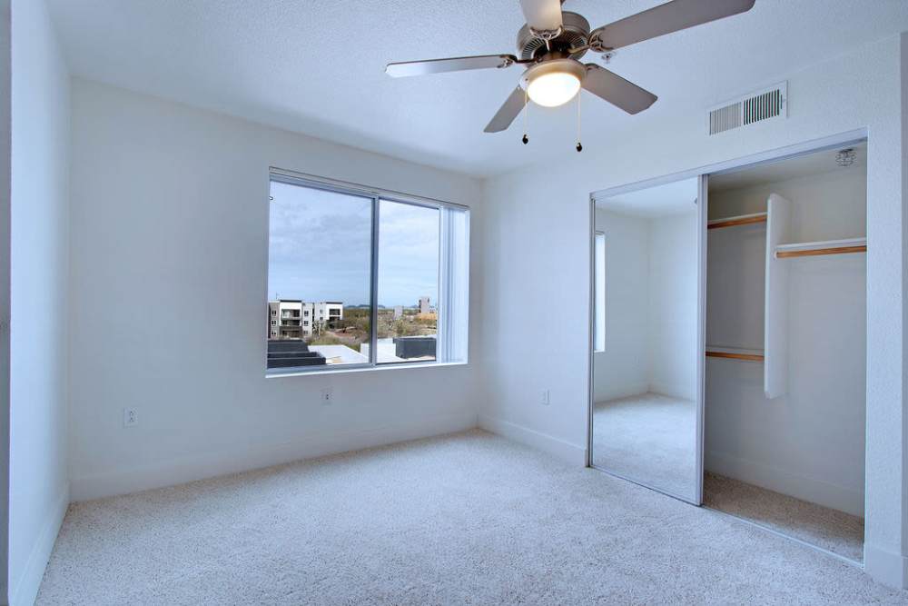 Bedroom with ceiling fan at  Ninety Degrees in Phoenix, Arizona