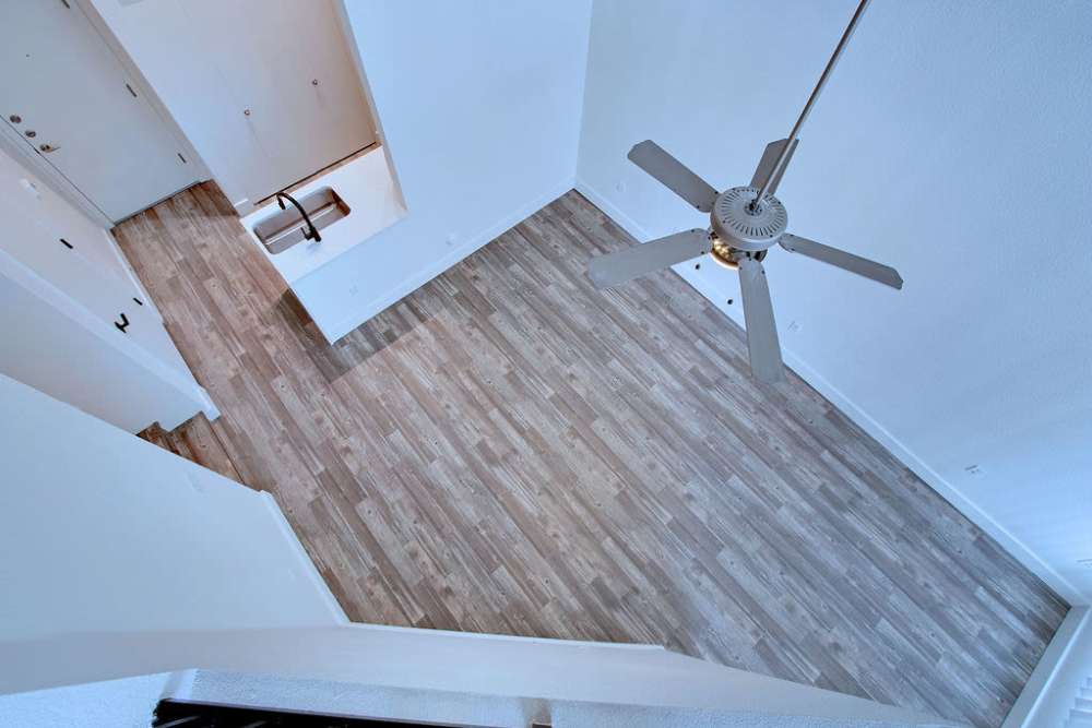 View looking down at living room from loft at  Ninety Degrees in Phoenix, Arizona