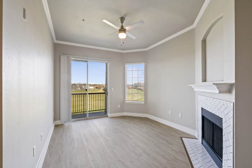 Showing patio door with fireplace at Milan in Austin, Texas