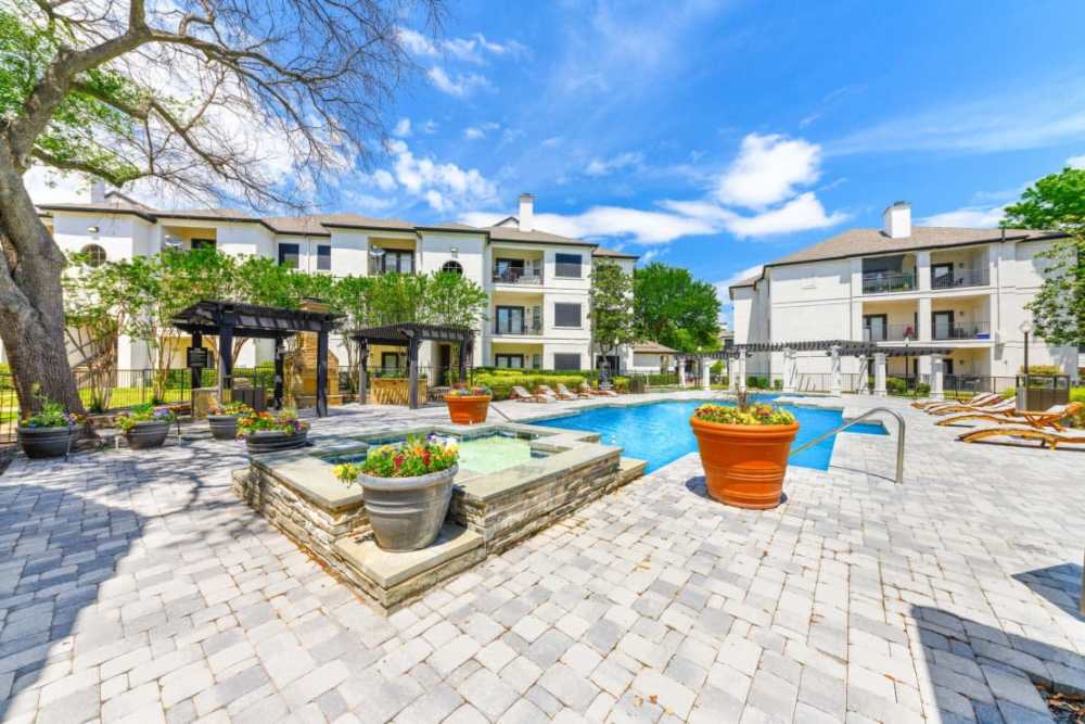 Large swimming pool with community barbecues at Benton in Dallas, Texas, 