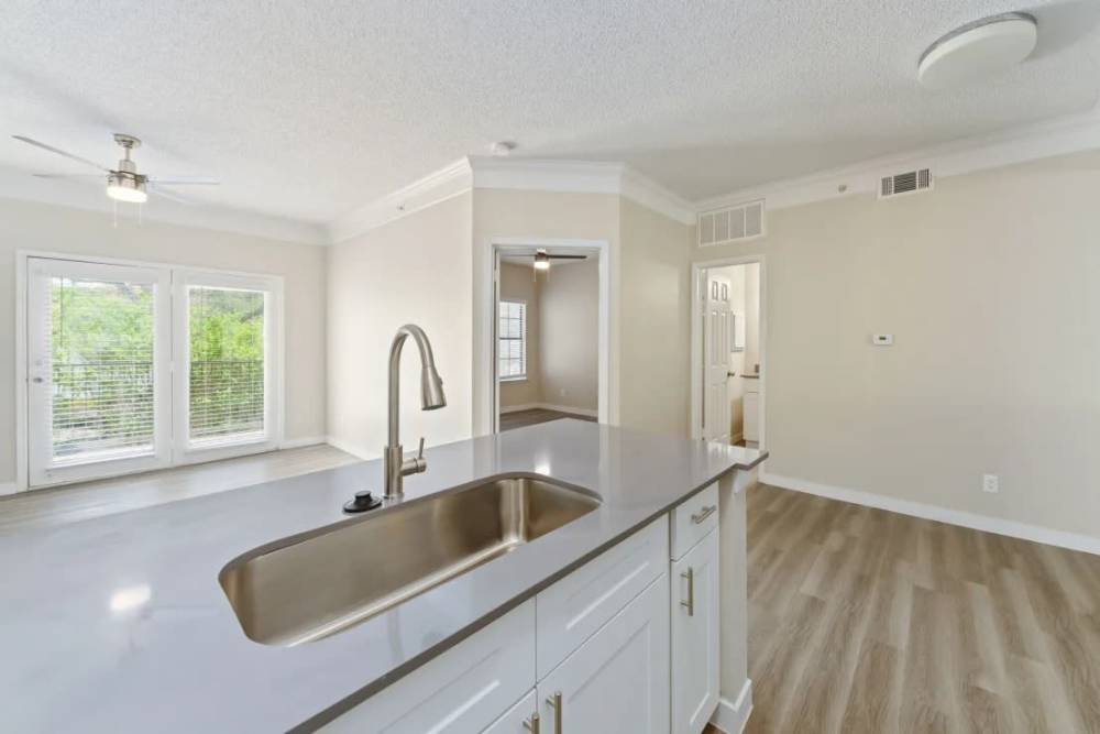 View of living room and bedroom from kitchen at Benton in Dallas, Texas, 