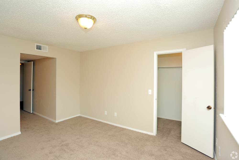 Carpeted bedroom in a model home at Vintage At 50th in Oklahoma City, Oklahoma