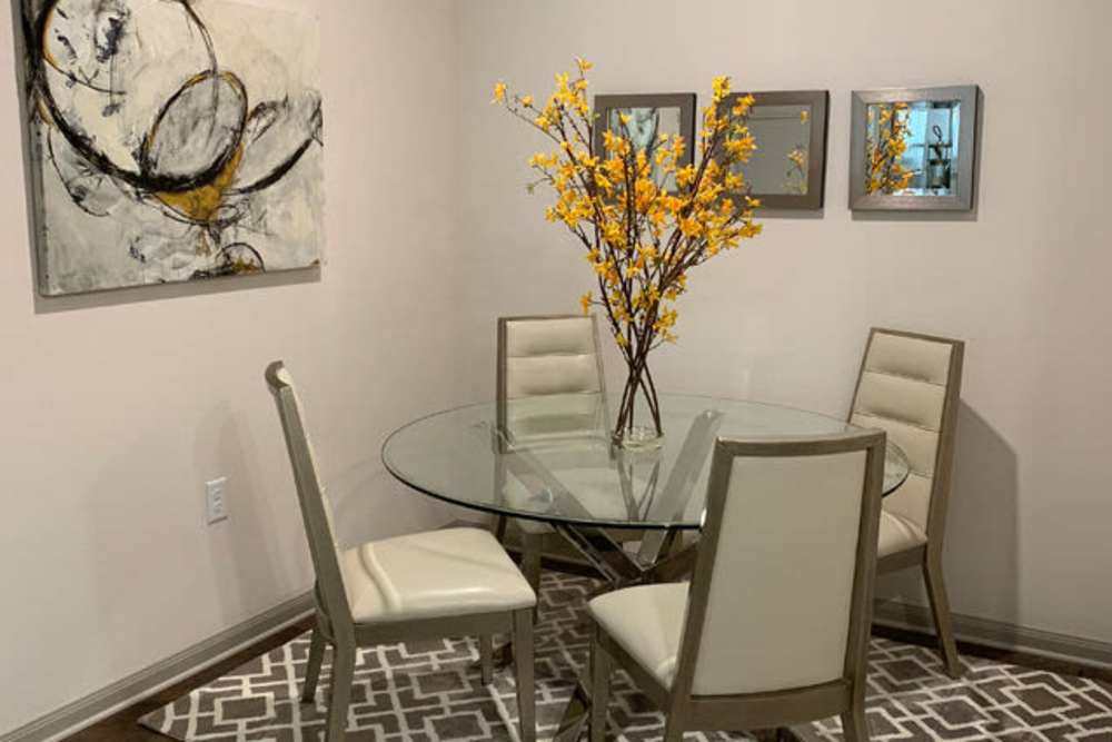 Dining room with carpeted flooring at Ashford Lakes in Houston, Texas