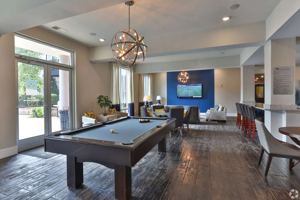 Game room with billiards table at South Ridge in Greenville, South Carolina  