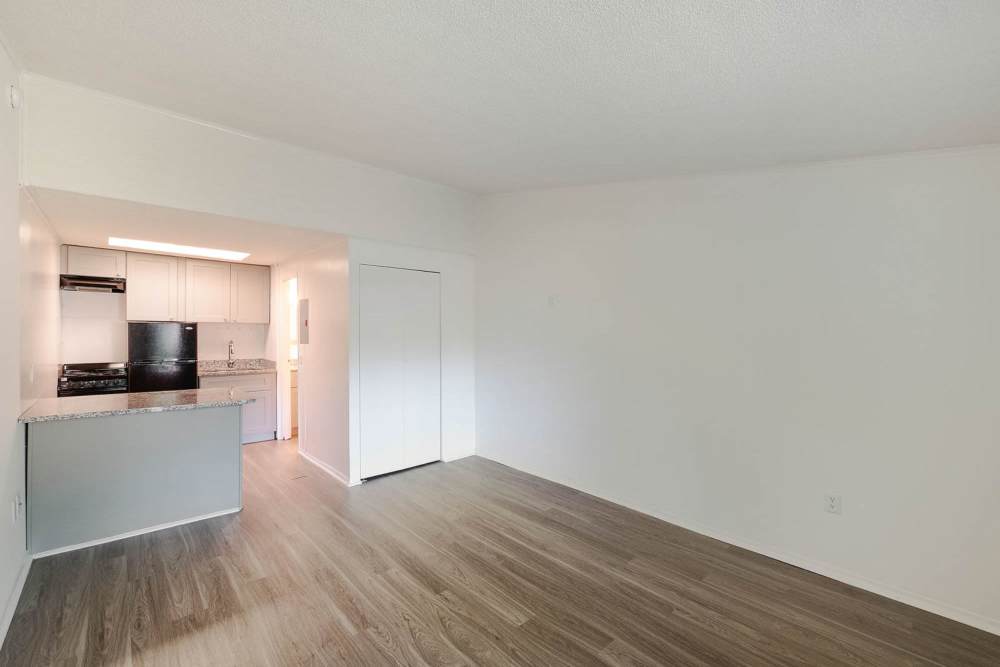 Living room with hardwood floors at The Flats at Lakeshore in Fort Oglethorpe, Georgia