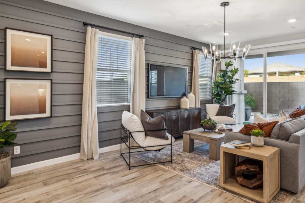 Living room with hardwood flooring in a model home at BB Living Desert Ridge in Phoenix, Arizona