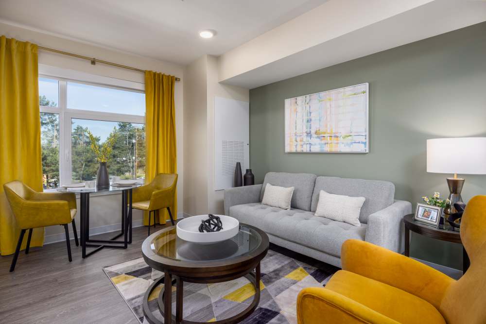 Model apartment living room 2 at Clearwater Beaverton in Beaverton, Oregon