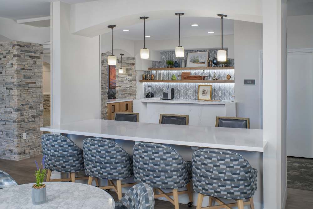A bar with chairs in a room at Ridge at the Stratford in Phoenix, Arizona