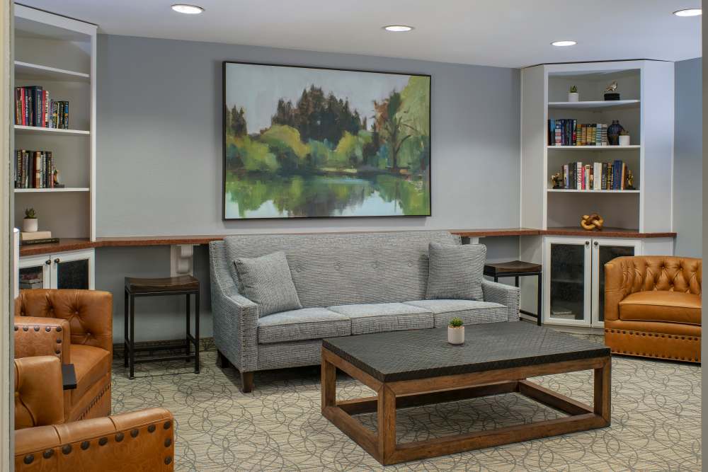 Lounge area with bookshelves at Ridge at the Stratford in Phoenix, Arizona