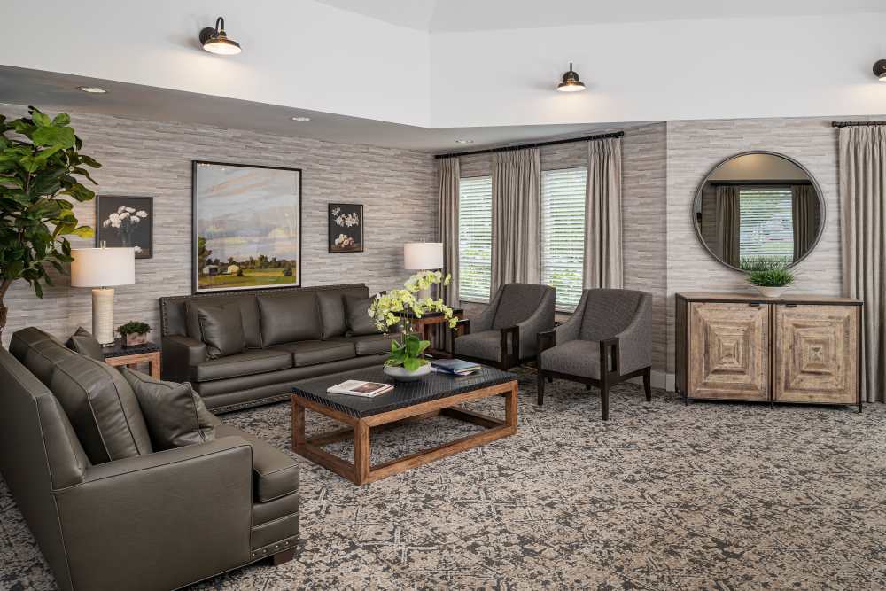 A room with chairs and tables at The Ridge at Oregon City in Oregon City, Oregon
