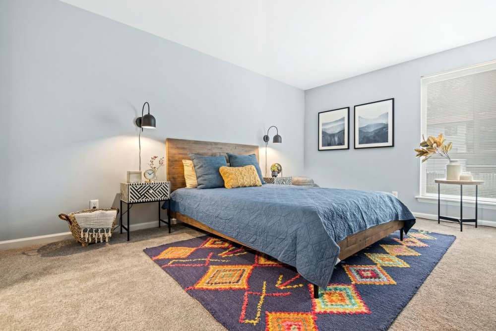 Cozy modal bedroom at Fairfield Crossing Apartments in Falls Church, Virginia