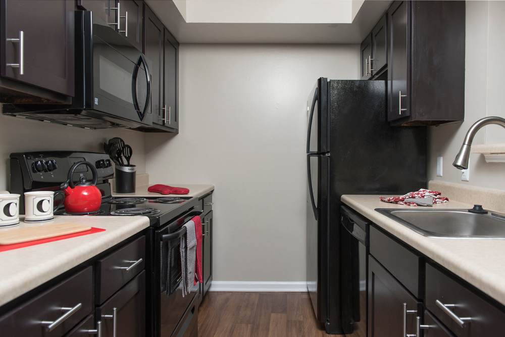 Fridge and other appliances in the kitchen at Crescent Centre Apartments & Townhomes in Louisville, Kentucky