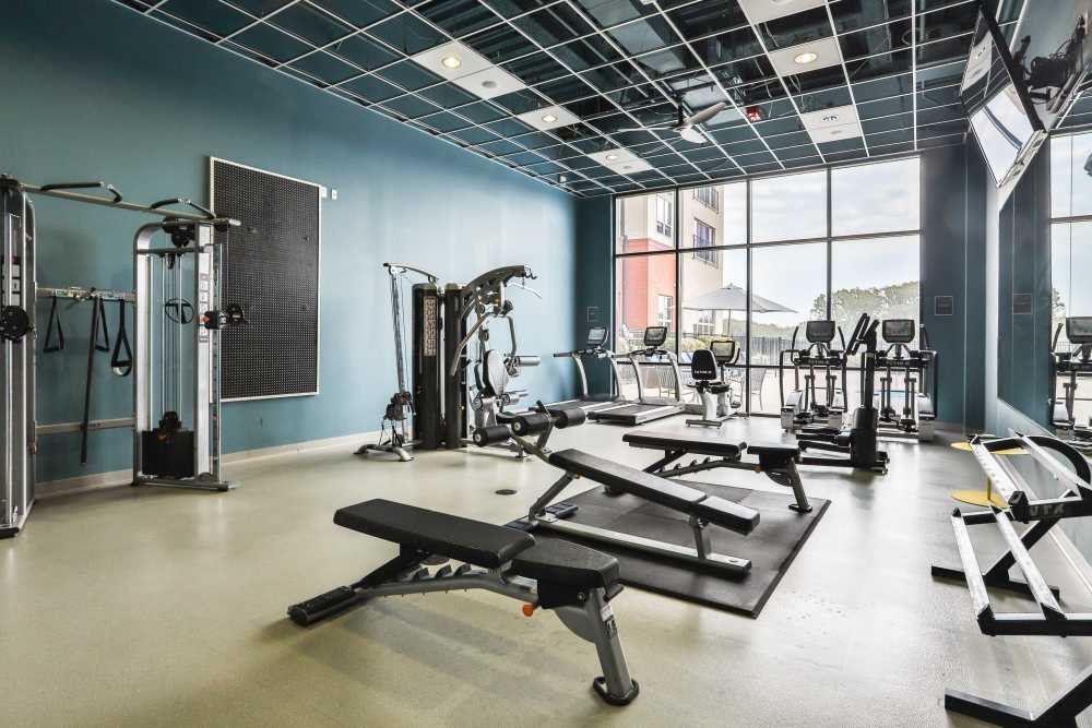 Fitness center at Residences at The Streets of St. Charles Apartment Homes in Saint Charles, Missouri