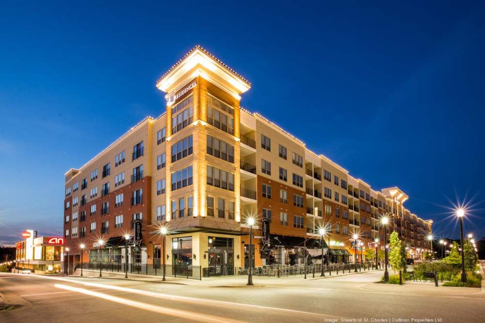 Community building exterior view  at Residences at The Streets of St. Charles Apartment Homes in Saint Charles, Missouri
