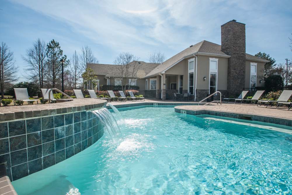 Shimmering community swimming pool at Waterford Place Apartments & Townhomes in Memphis,Tennessee
