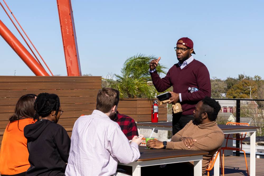 Rooftop hang out spot with grill stations at Union Terminal Warehouse in Jacksonville, Florida