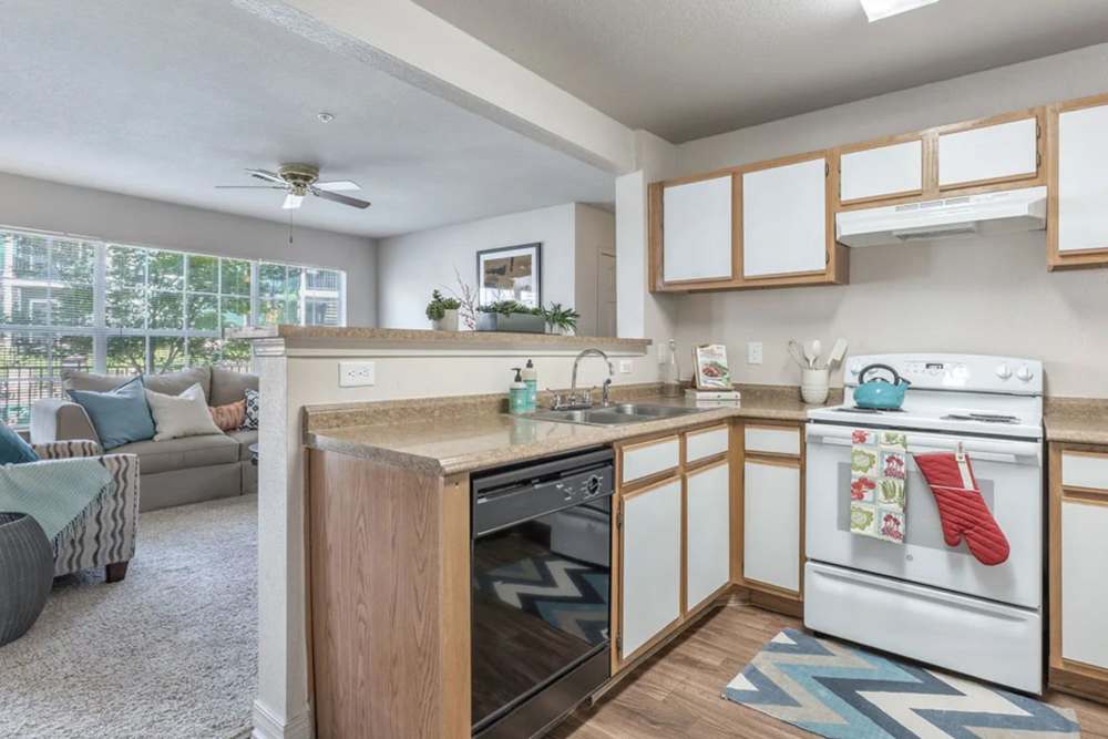 Kitchen with ample counter space at Villas at Bailey Ranch Apartment Homes in Owasso, Oklahoma